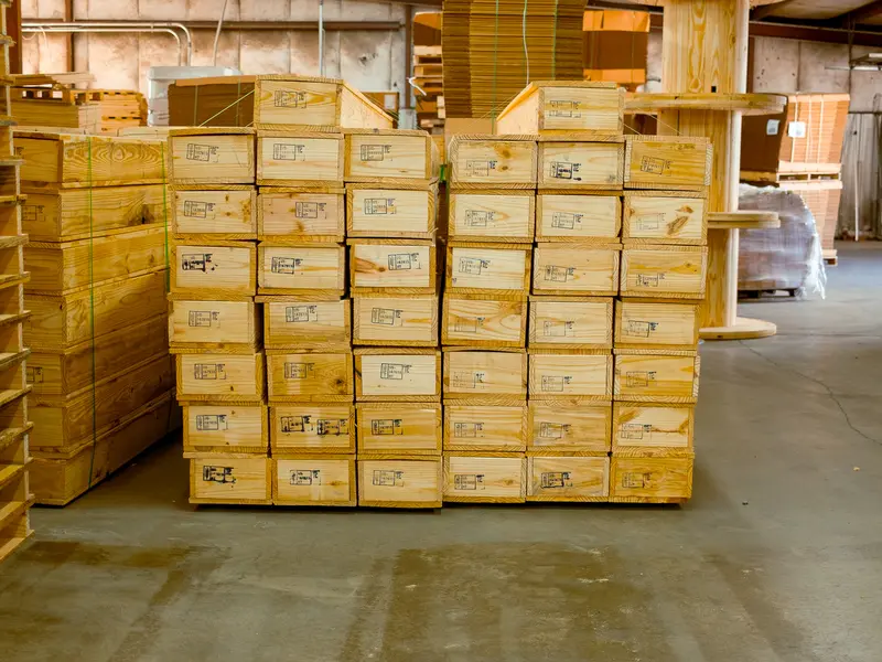 Stamped wooden shipping crates stacked for delivery