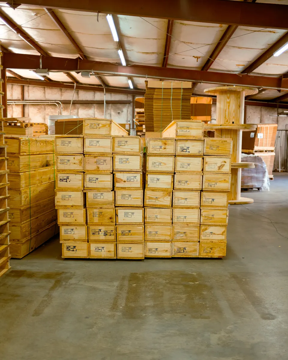 Custom wood crates stacked and stamped for shipment