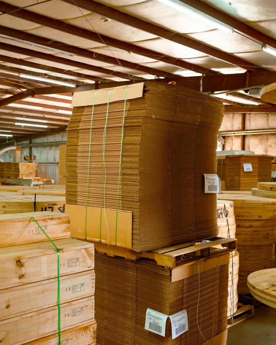 Gaylord bulk bins on 48x40 pallets in the warehouse
